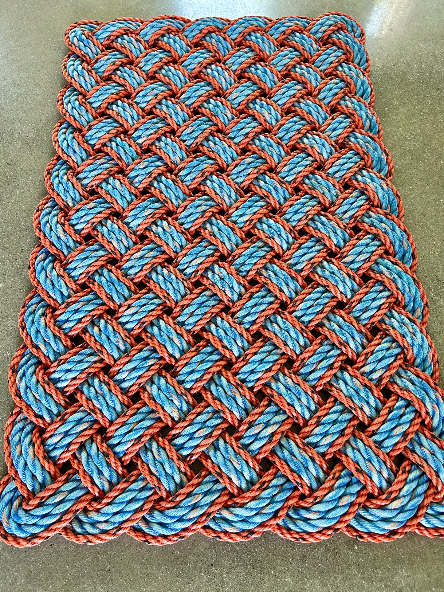 Vibrant lobster rope mat