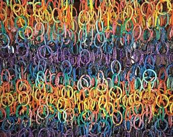Whimsical rope garland used for tree trimming, picture/photo hanging, framing a window or strung along porch railings